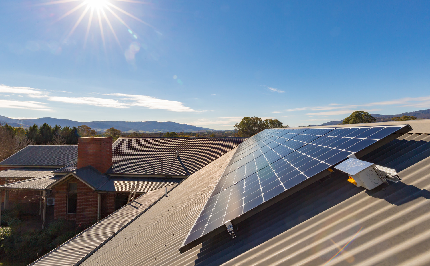 A roof solar panel underneath the sun
